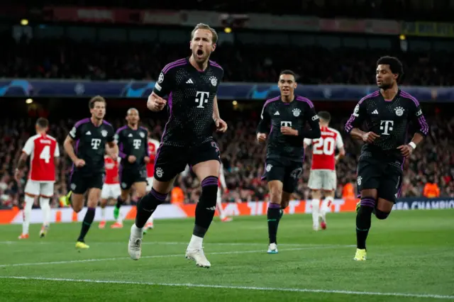 Kane celebrates his goal v Arsenal