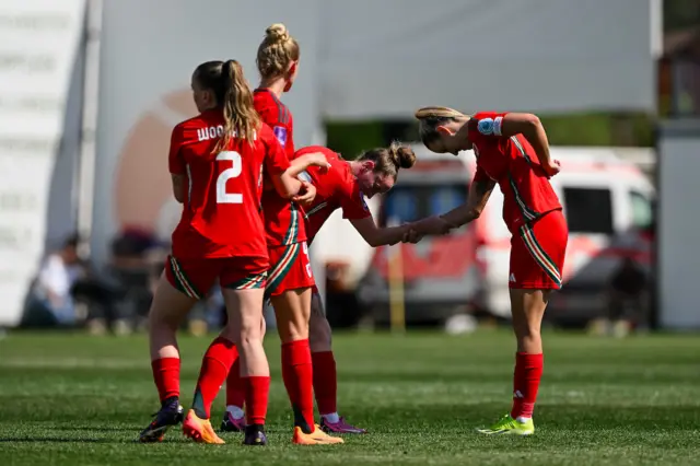 Wales players celebrate Rachel Rowe's goal