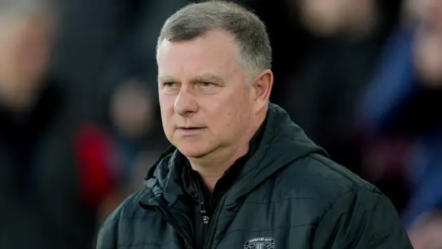 Coventry boss Mark Robins on the touchline