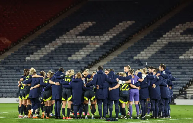 Scotland national team huddle after game at Hampden