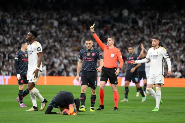 Tchouameni is booked for a foul