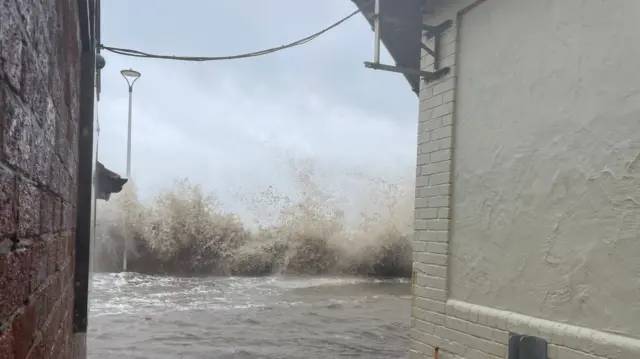 Water breaches sea defences in West Kirby