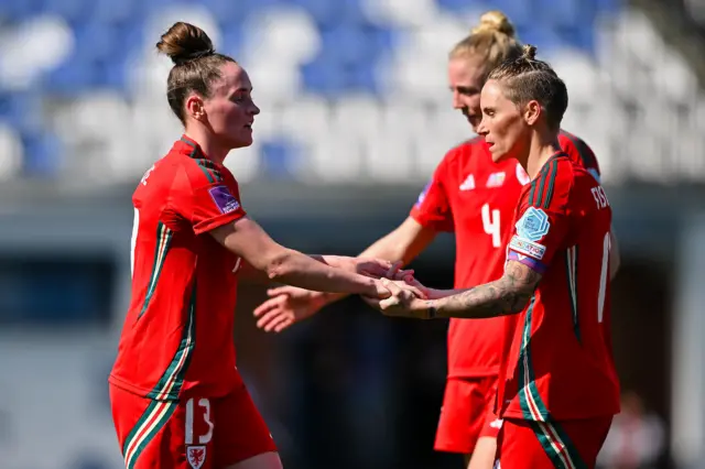 Wales players celebrate Rachel Rowe's second goal