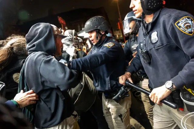 Pro-Palestinian supporters confront police during demonstrations at The City College Of New York (CUNY)