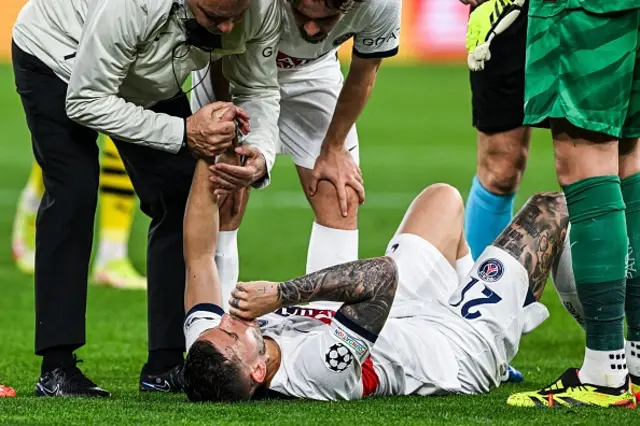 Lucas Hernandez lays on the turf injured