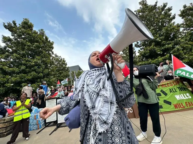 Protester holding megaphone in Dallas