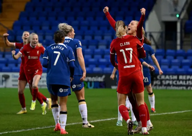 Sophie Roman Haug of Liverpool celebrates scoring Liverpool's first goal with Jenna Clark during the Barclays Women´s Super League match between Liverpool FC and Chelsea FC at Prenton Park on May 01, 2024 in Birkenhead, England.