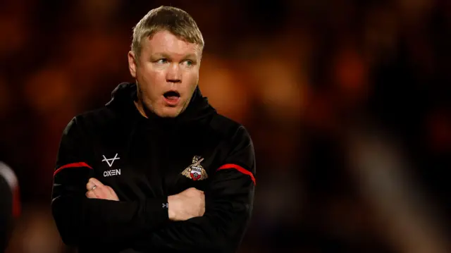 Doncaster boss Grant McCann looks on nervously