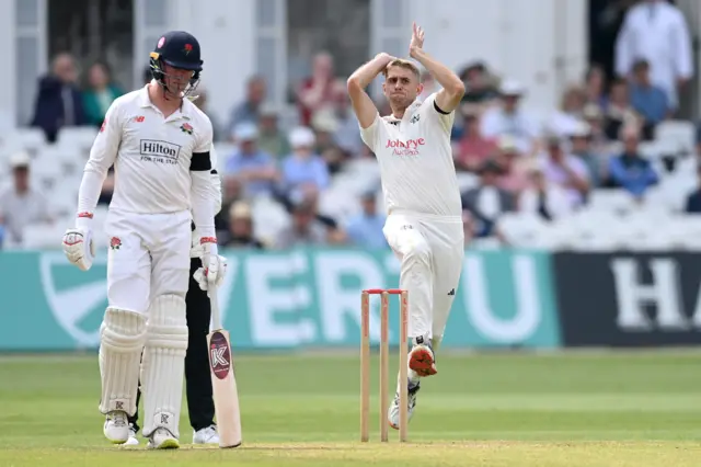 Olly Stone bowling