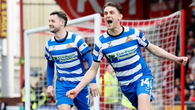 Harrison Biggins celebrates a goal for Doncaster