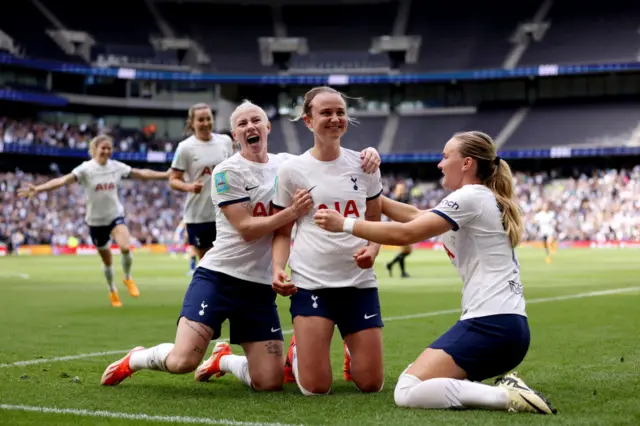 Martha Thomas celebrates