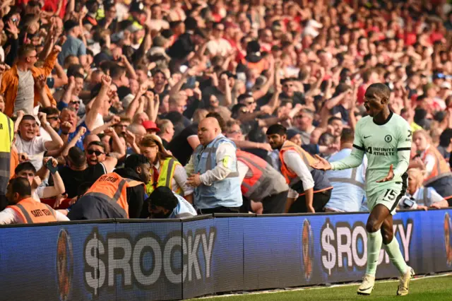 Nicolas Jackson celebrates scoring the team's third goal during the English Premier League football match between Nottingham Forest and Chelsea