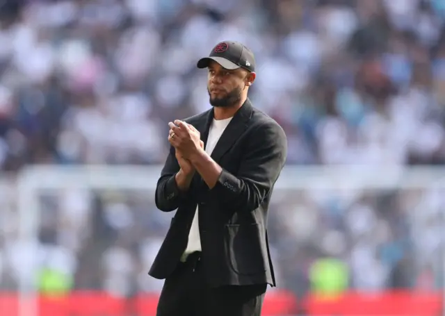 Vincent Kompany the head coach / manager of Burnley applauds the fans after being relegated following defeat in the Premier League match between Tottenham Hotspur and Burnley FC