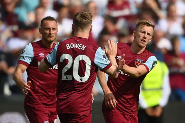 James Ward-Prowse of West Ham United celebrates scoring his team's first goal with teammates Jarrod Bowen (obscured) and Vladimir Coufal