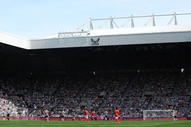 The 'Inside Matters' mental health campaign message is seen on the ad boards during the Premier League match between Newcastle United and Brighton & Hove Albion