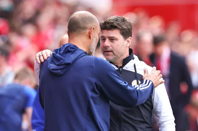 Nuno Espírito Santo the head coach / manager of Nottingham Forest and Mauricio Pochettino the head coach / manager of Chelsea during the Premier League match between Nottingham Forest and Chelsea FC