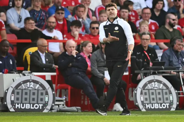 Argentinian head coach Mauricio Pochettino gives instructions to the players from the touchline during the English Premier League football match between Nottingham Forest and Chelsea