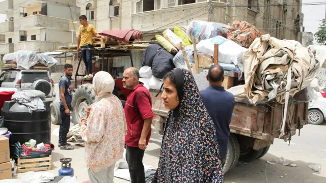 People prepare to evacuate in Rafah