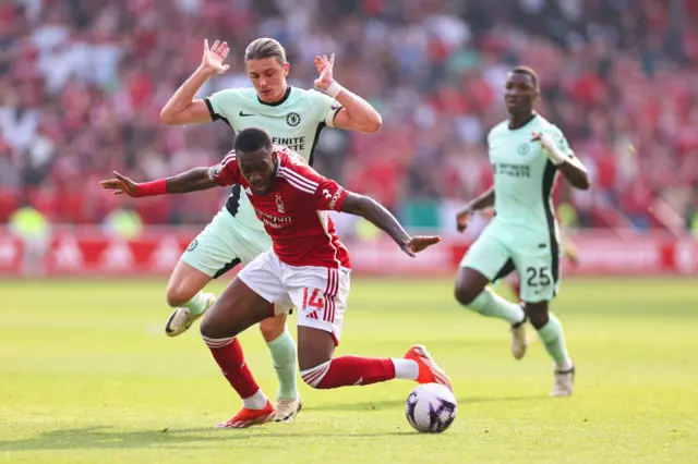 Conor Gallagher of Chelsea brings down Callum Hudson-Odoi of Nottingham Forest during the Premier League match between Nottingham Forest and Chelsea FC