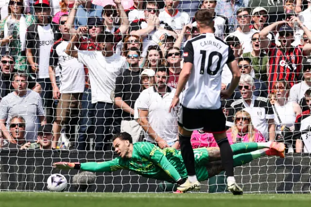 Manchester City's Brazilian goalkeeper Ederson saves a shot during the English Premier League football match between Fulham and Manchester City at Craven Cottage