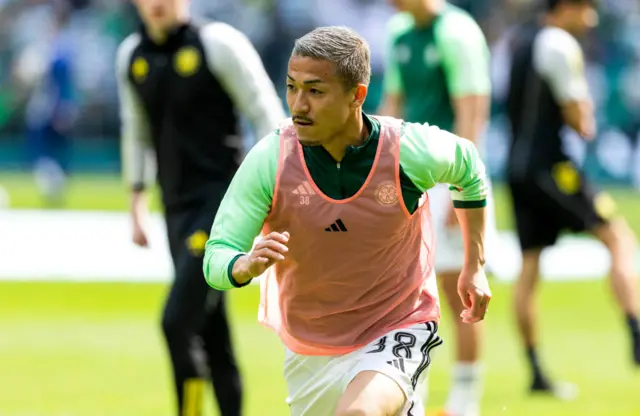 Celtic winger Daizen Meada warming up