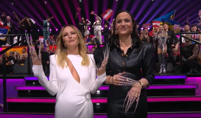 Hosts at the Eurovision Song Contest don fake nails.