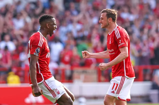 Willy Boly of Nottingham Forest celebrates after scoring a goal to make it 1-1 during the Premier League match between Nottingham Forest and Chelsea FC