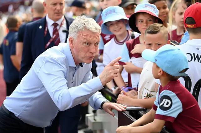 David Moyes, Manager of West Ham United, interacts with fans