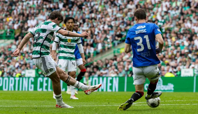 Celtic's Matt O'Riley scores to make it 1-0 during a cinch Premiership match between Celtic and Rangers at Celtic Park