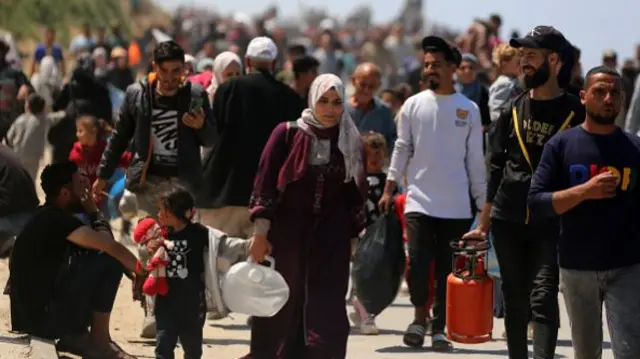 Displaced Palestinians are walking to find new shelter, April 2024