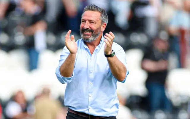 Derek McInnes applauds the visiting supporters in Paisley