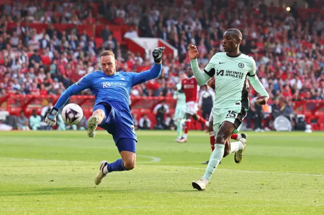 Matz Selz of Nottingham Forest clears under pressure from Nicolas Jackson of Chelsea during the Premier League match between Nottingham Forest and Chelsea FC