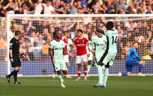 Raheem Sterling of Chelsea celebrates scoring his team's second goal with teammate Trevoh Chalobah during the Premier League match between Nottingham Forest and Chelsea FC