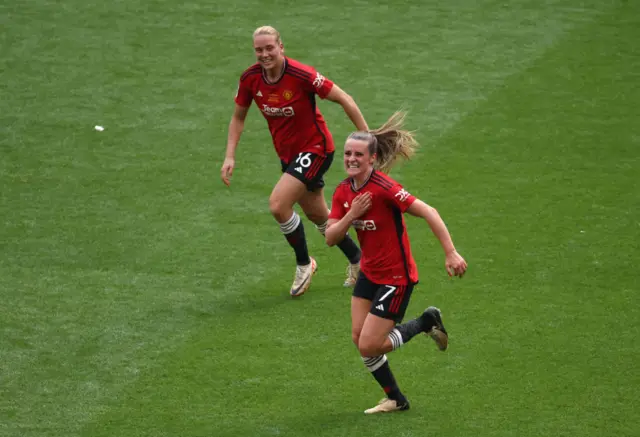 Ella Toone of Manchester United celebrates scoring her team's first goal with teammate Lisa Naalsund during the Adobe Women's FA Cup Final match between Manchester United and Tottenham Hotspur