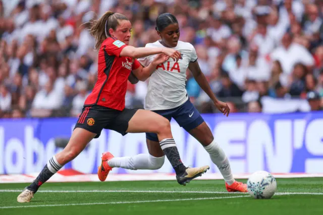 Jessica Naz of Tottenham Hotspur is challenged by Ella Toone of Manchester United as they chase the loose ball during the Adobe Women's FA Cup Final match between Manchester United and Tottenham Hotspur