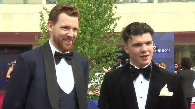 Paul Gorton and Harry Clark on the red carpet at the baftas talking to the BBC