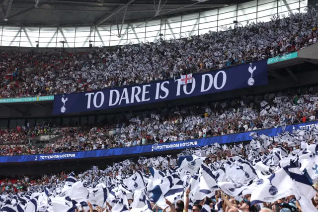 Fans of Tottenham Hotspur show their support prior to the Adobe Women's FA Cup Final match between Manchester United and Tottenham Hotspur