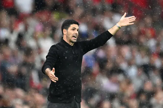 Mikel Arteta, Manager of Arsenal, reacts during the Premier League match between Manchester United and Arsenal FC