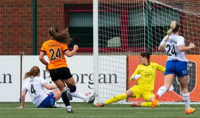 Kathy Hill almost turns the ball into her own net