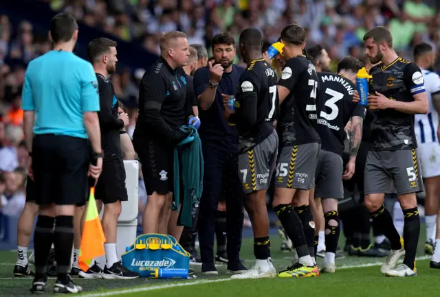 Southampton players have a drinks break