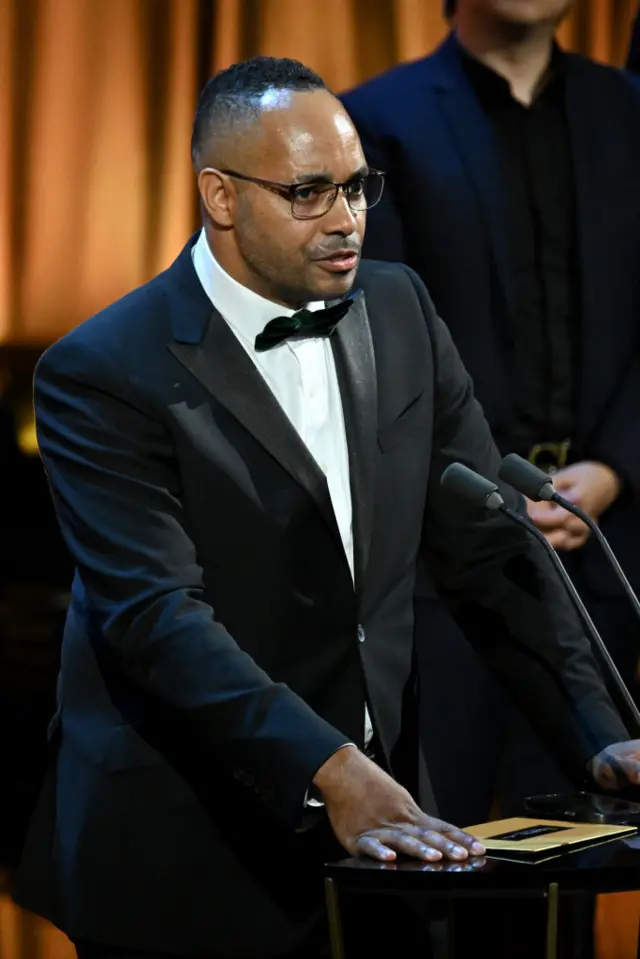 Producer Andy Mundy-Castle accepts the award for specialist factual