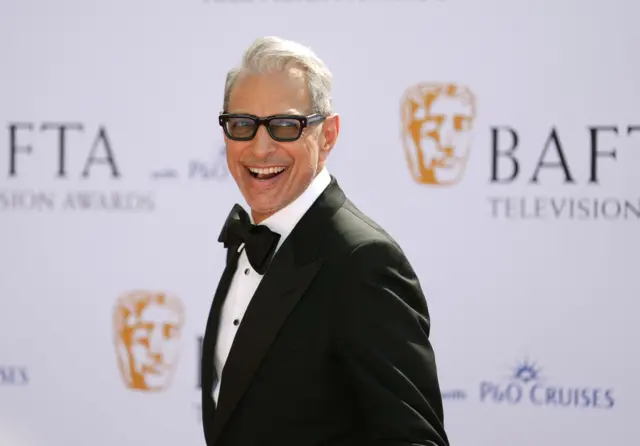 American actor Jeff Goldblum, who starred in the likes of Jurassic Park and Independence Day, flashes a smile for the cameras