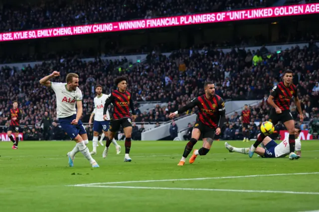 Harry Kane scores for Tottenham against Manchester City