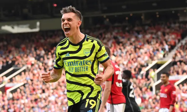 Leandro Trossard celebrates scoring against Manchester United