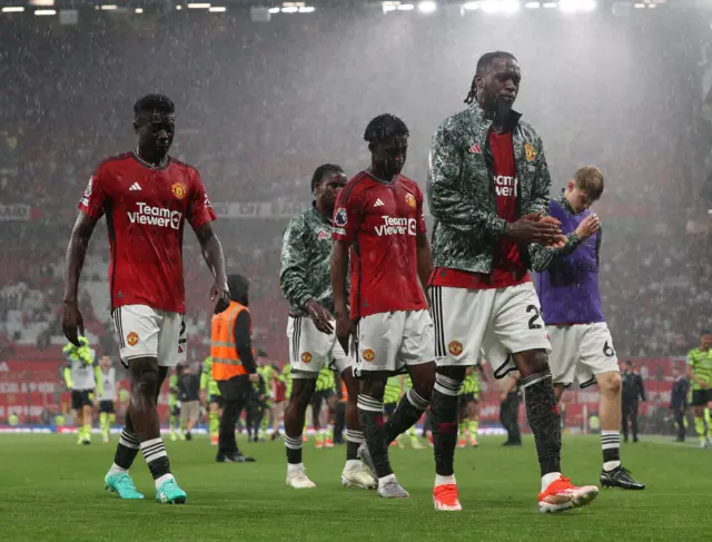 Manchester United players leave the field at Old Trafford