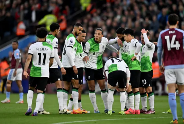 Virgil van Dijk captain of Liverpool talking with his players