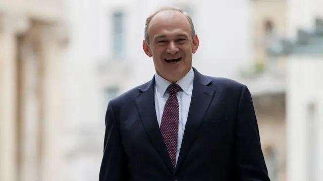 Ed Davey smiling at the camera