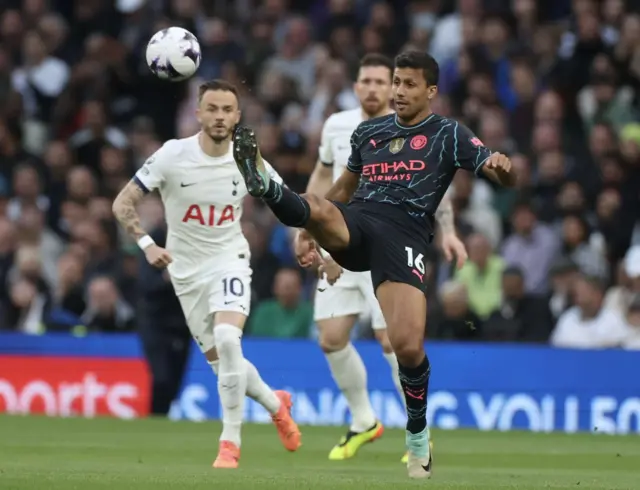 Rodri wins the ball in midfield