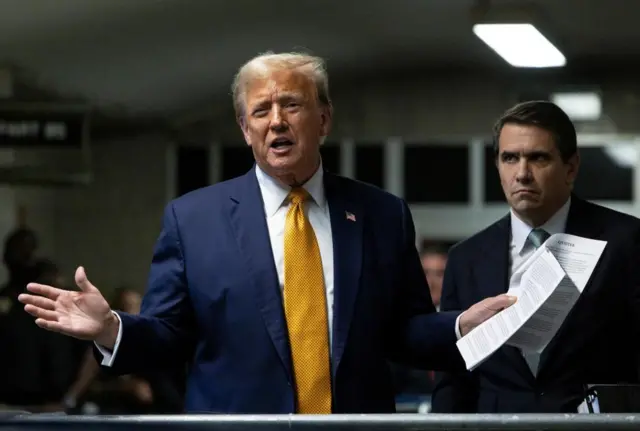 Donald Trump speaks outside court