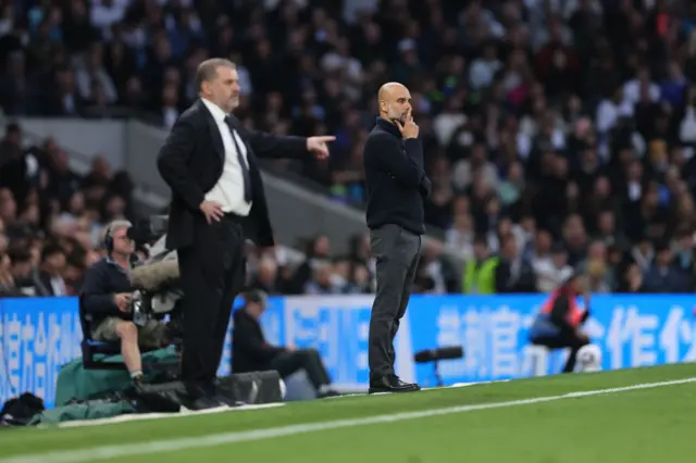 Pep and Ange stand thoughtfully in their technical areas